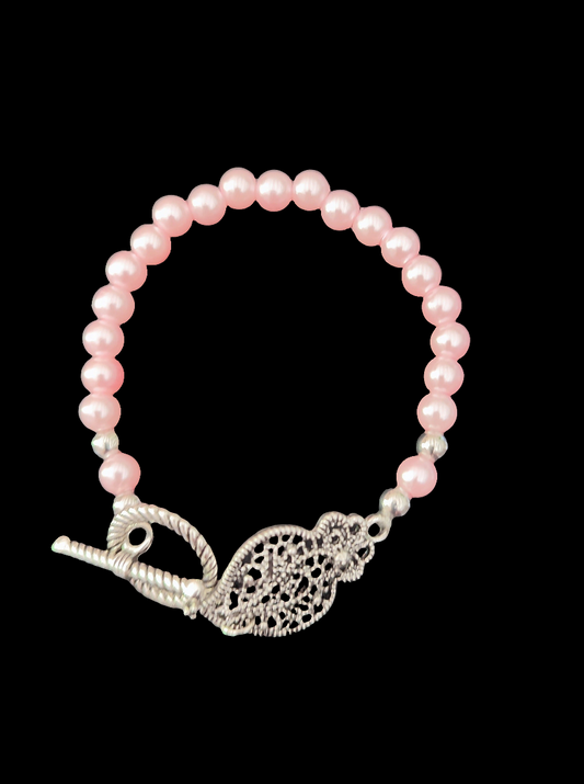 bracelet fantaisie avec perles roses ainsi que le Cœur de Viana, fait main. Made in Portugal